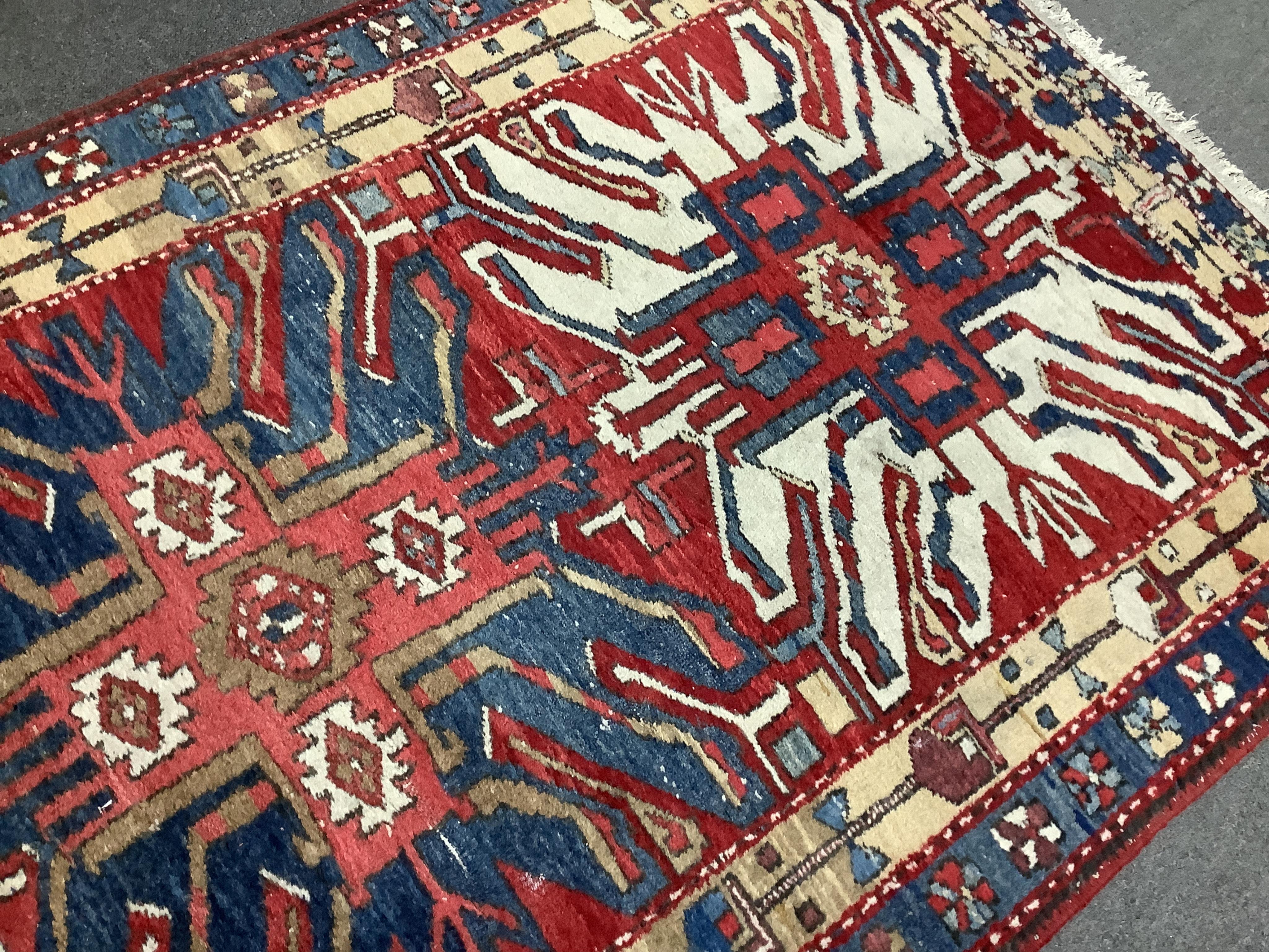 A Caucasian runner with stylised eagle motifs, 330 x 103cm